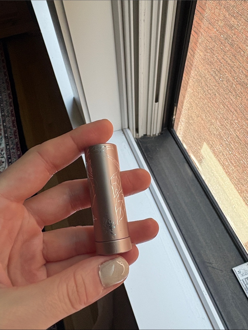 New 100% pure purple lipstick shade tempest
